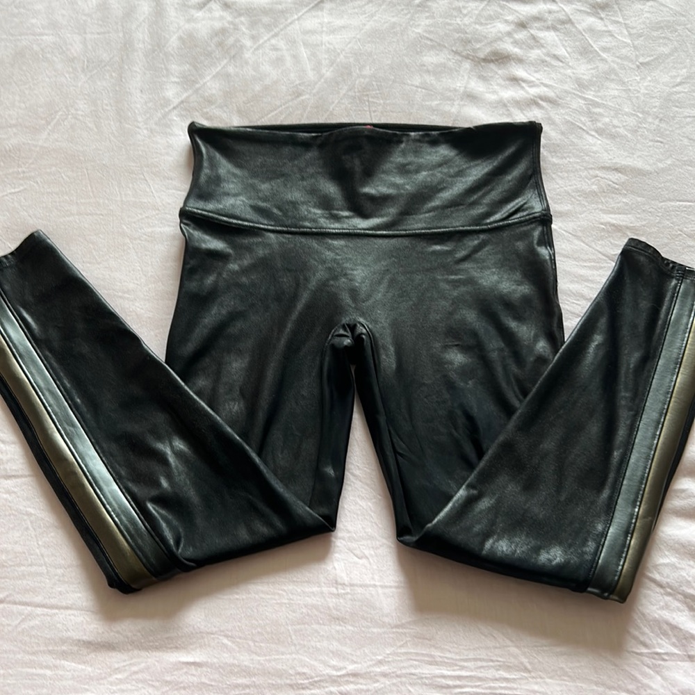 Spanx leggings size Large with metallic stripes down sides